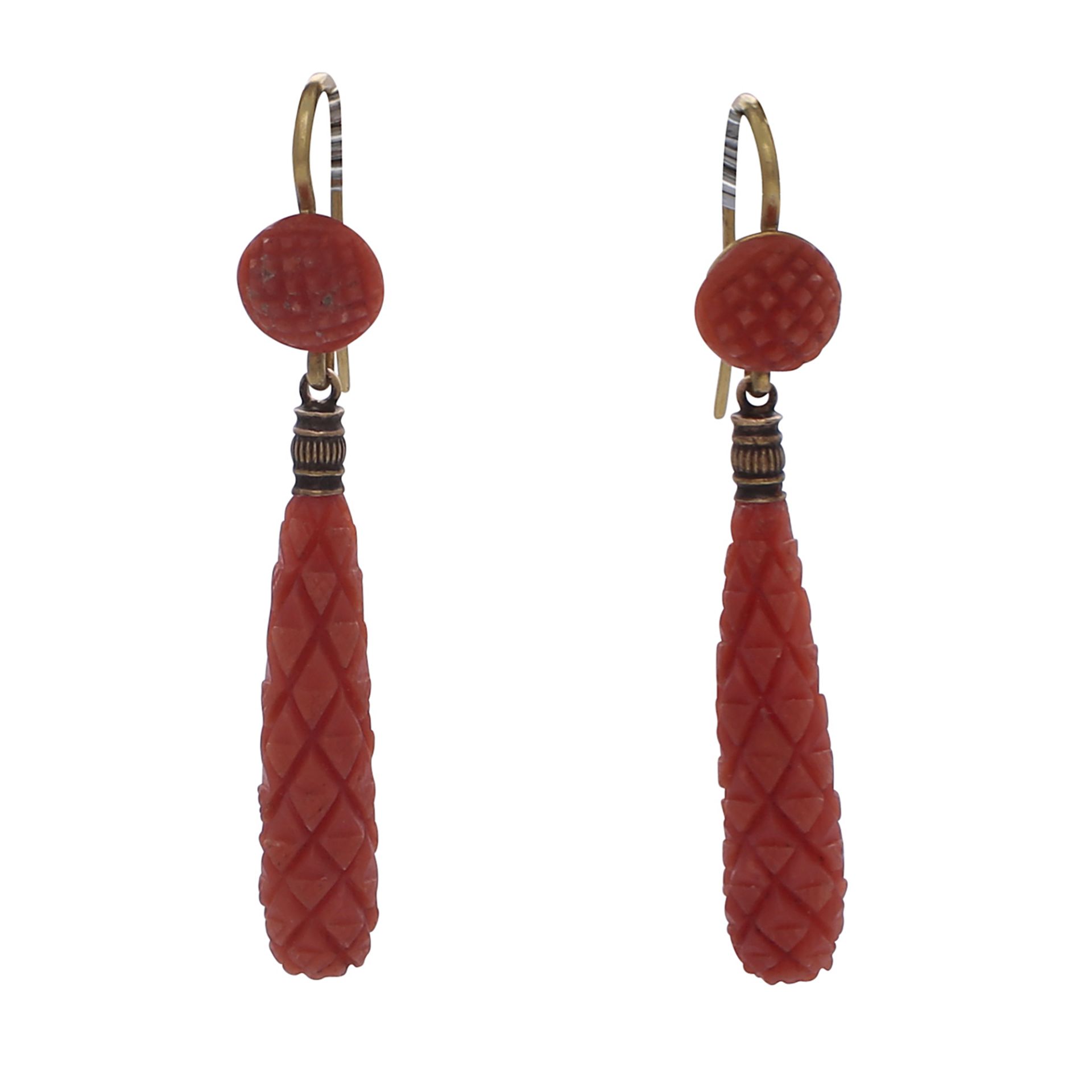 A pair of antique coral drop earrings each designed as carved coral drop pendant suspended from a