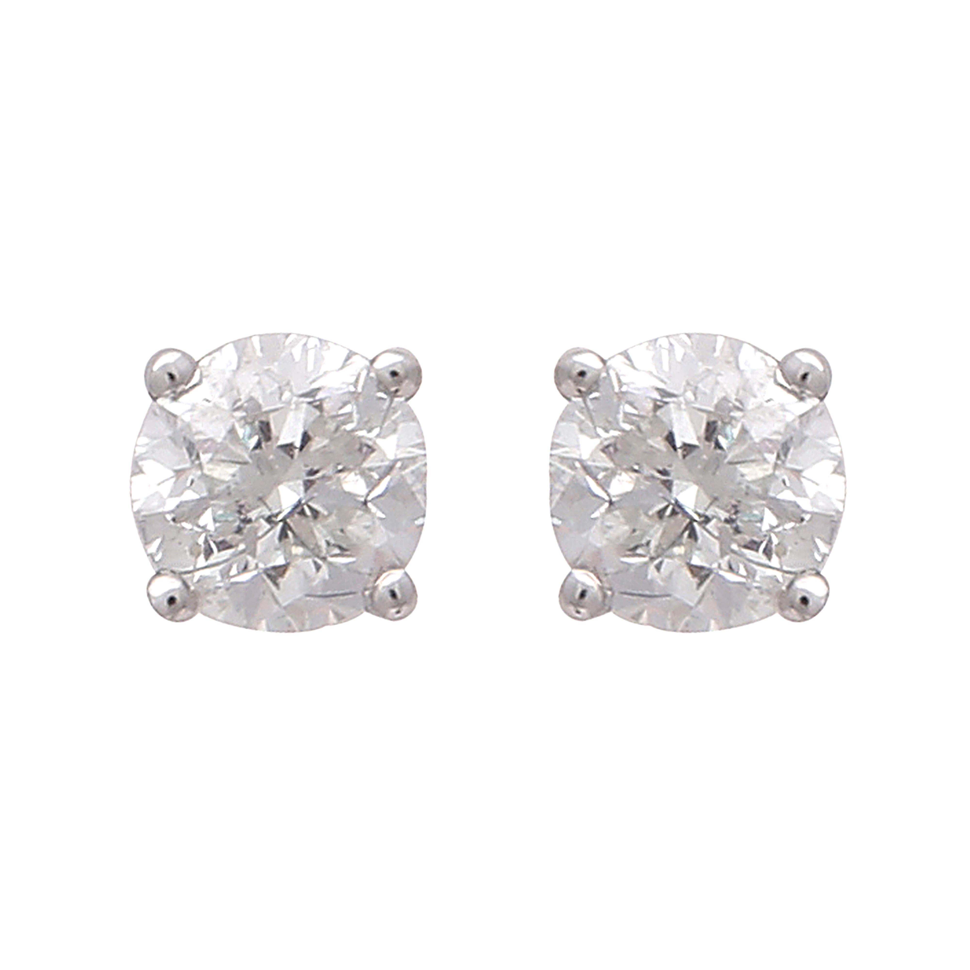 A pair of diamond stud earrings in 18ct white gold each claw set with a round cut diamond. Estimated