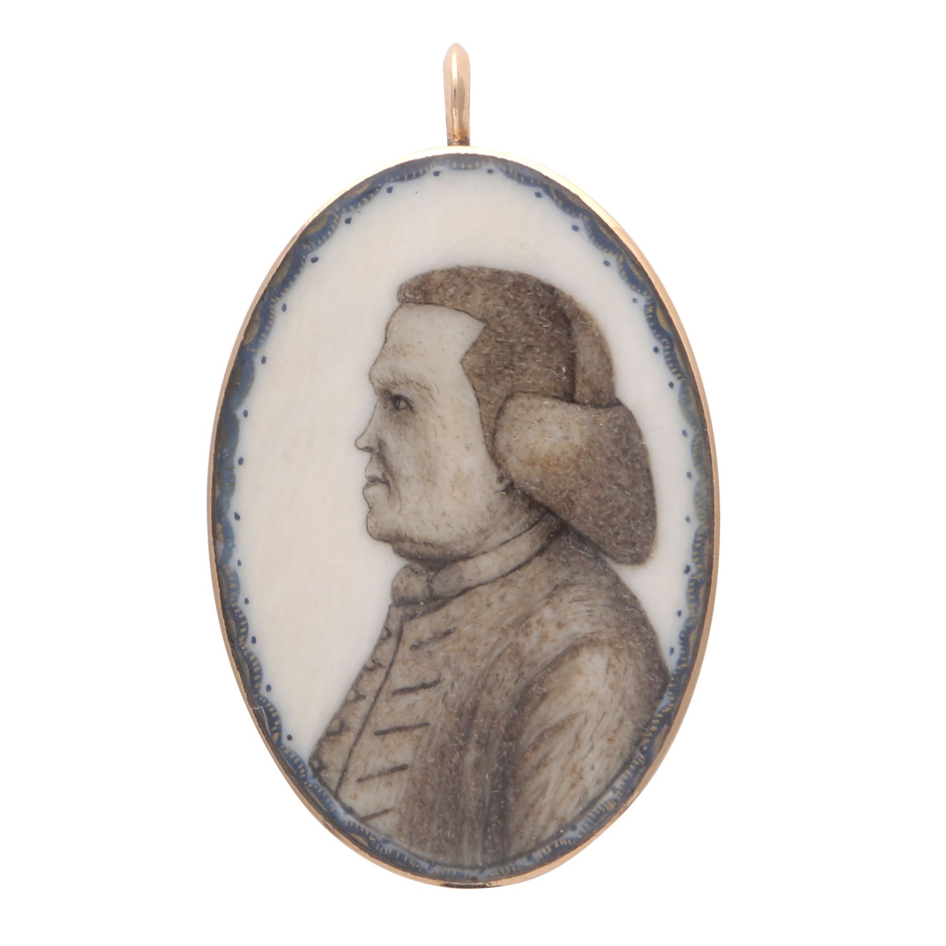 An antique Victorian hairwork portrait miniature pendant in yellow gold, of oval form, depicting a