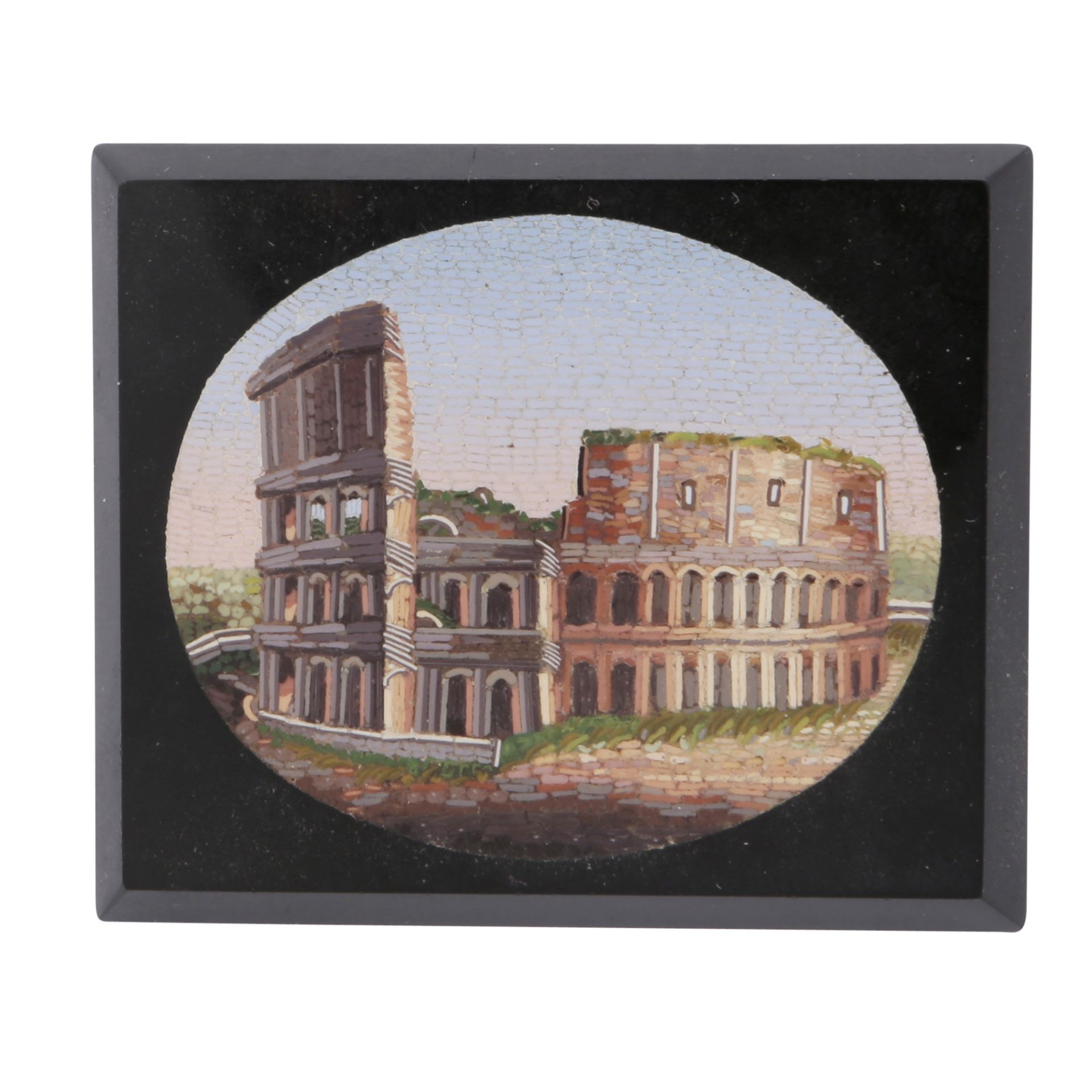 An antique 19th Century micromosaic panel depicting the Roman Colosseum in an oval aperture on a