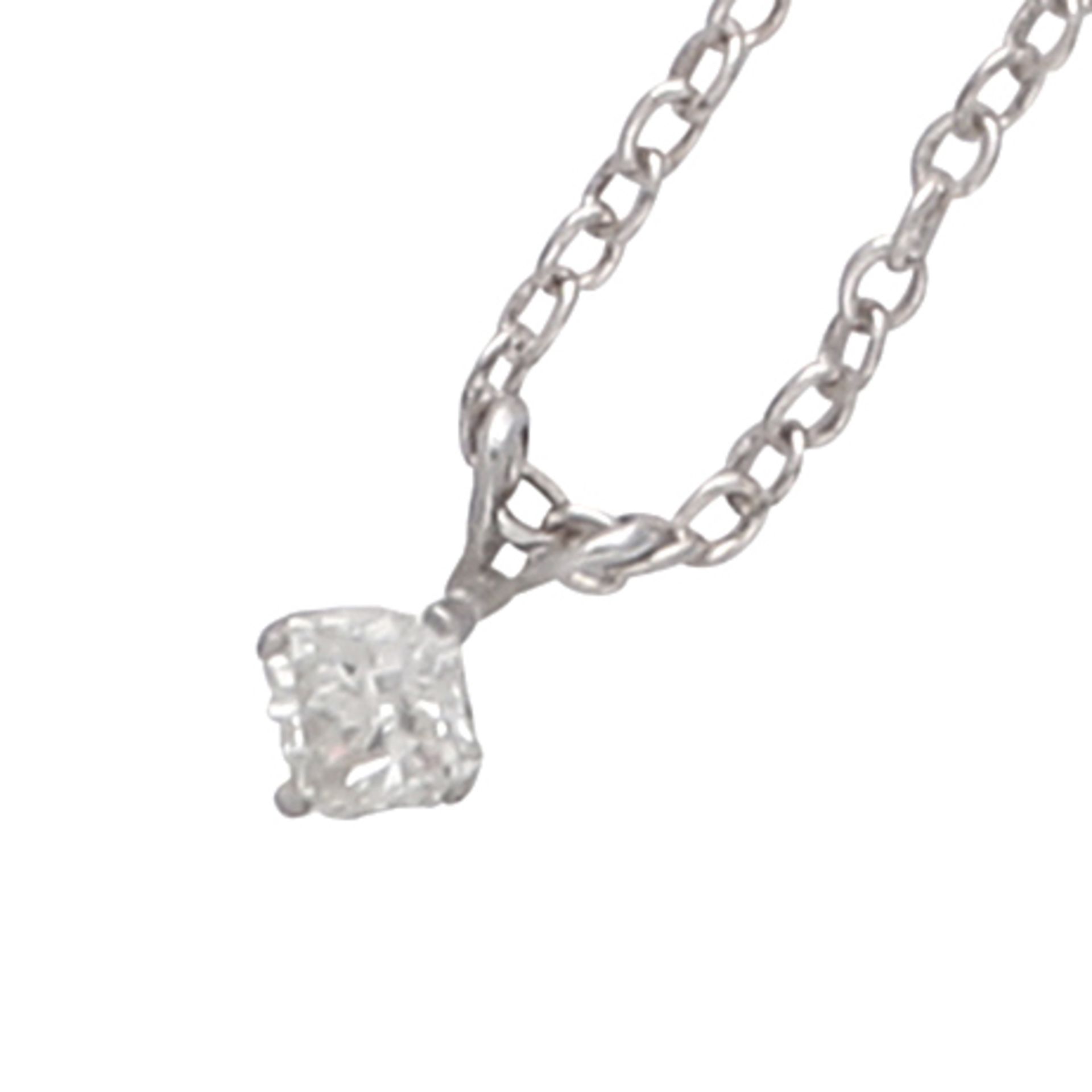 A diamond solitaire pendant in 18ct white gold claw set with a radiant cut diamond weighing