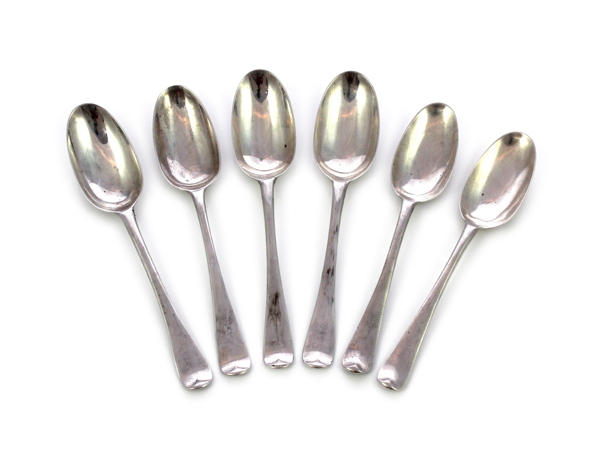 Four antique Queen Anne Britannia Silver dessert spoons London 1715, makerâ€™s marks rubbed. In