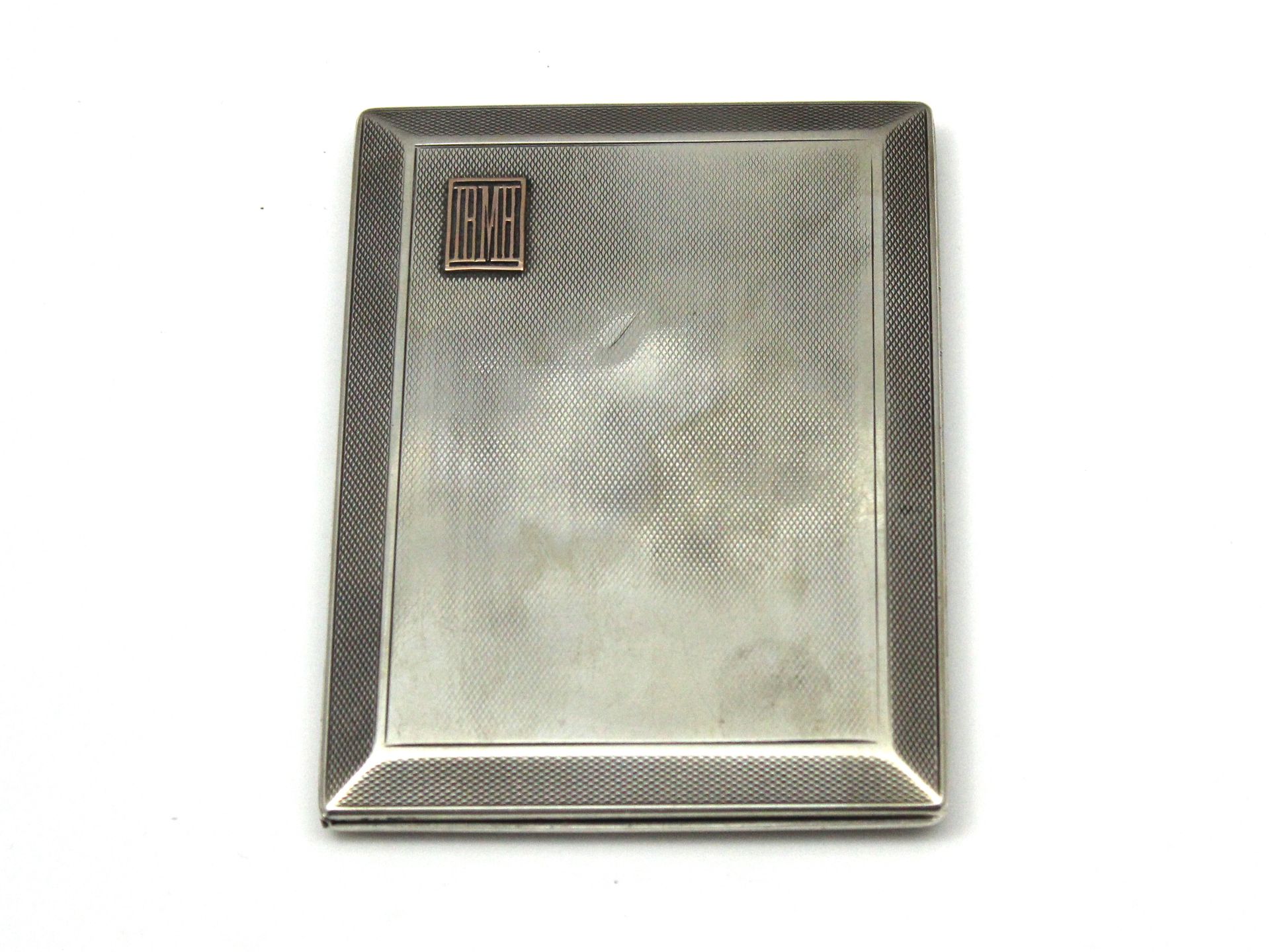 An antique George V Sterling Silver and gold sliding cigarette case by Asprey & Co Ltd, London 1924.