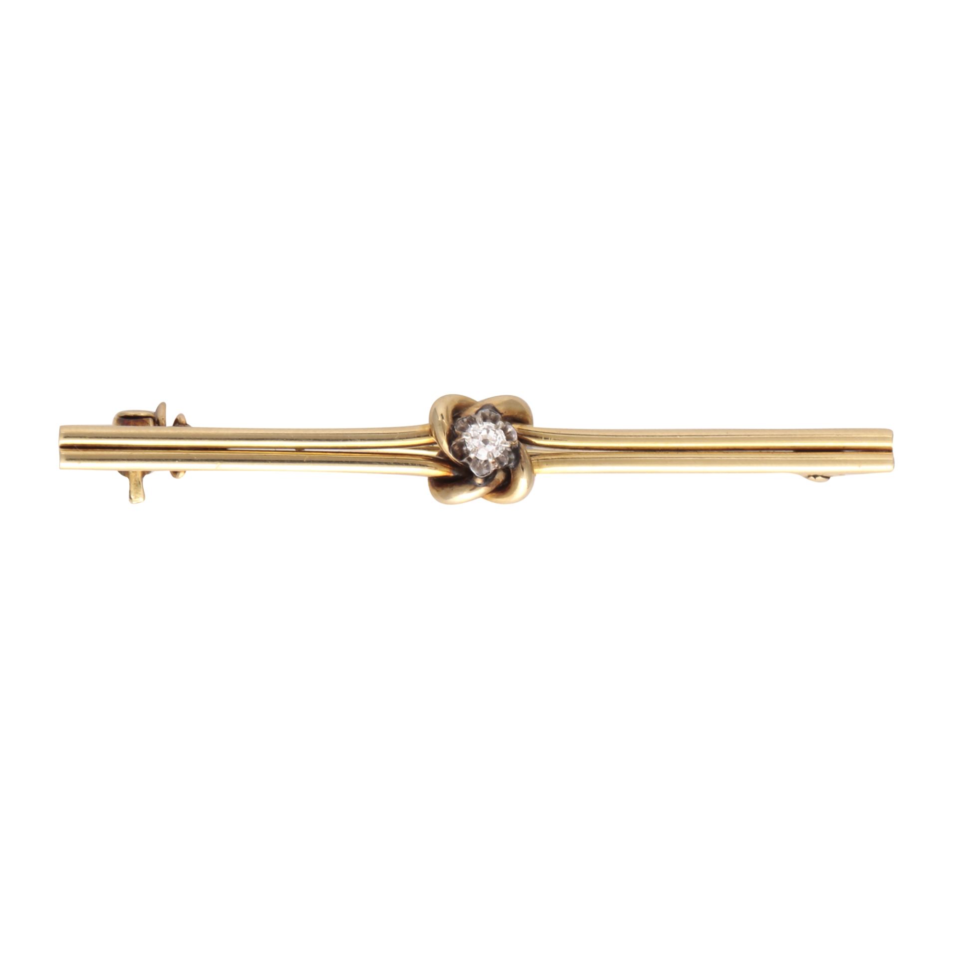 An antique diamond bar brooch probably German in 14ct yellow gold, set with an old cut diamond