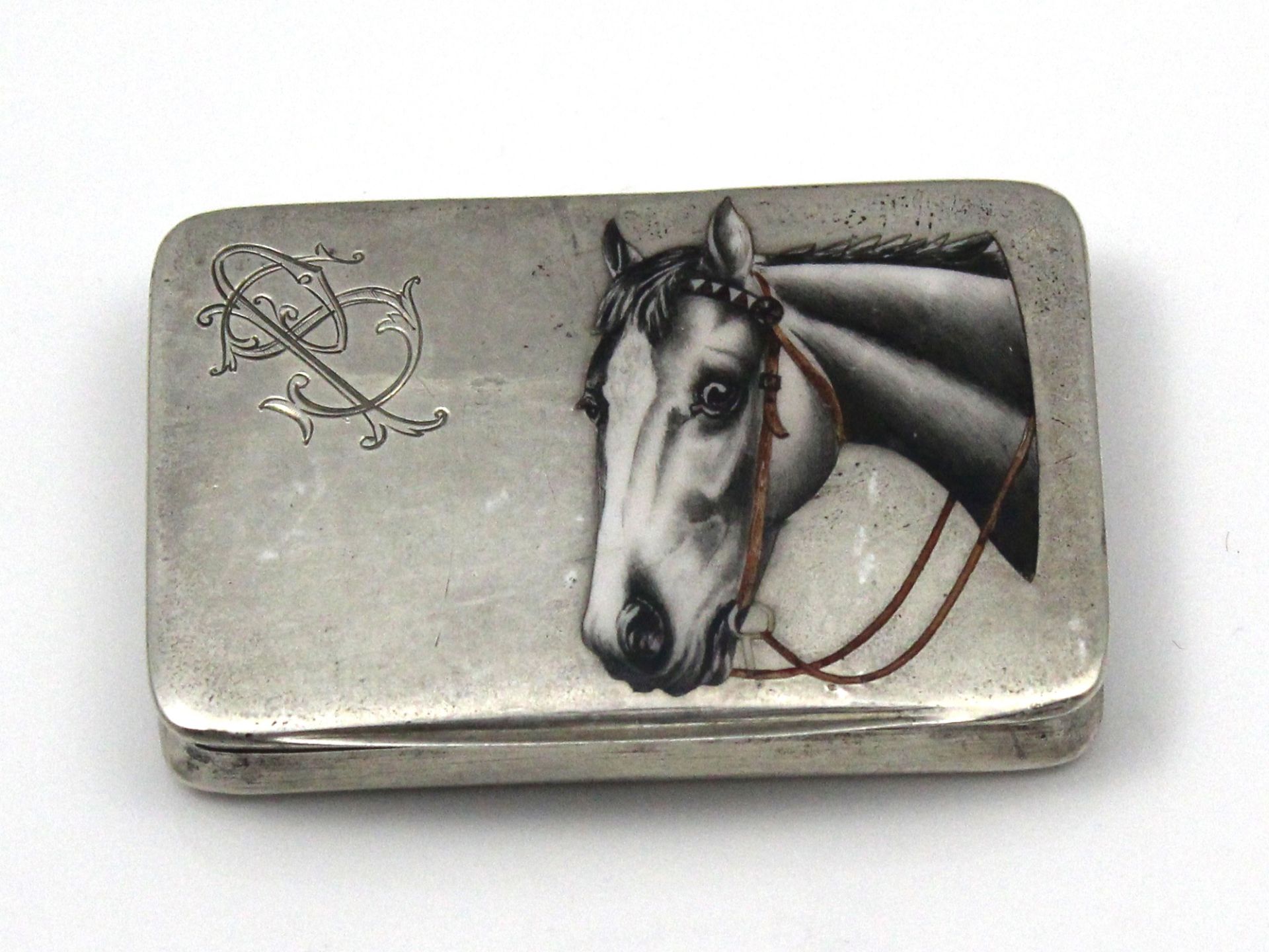 An antique German 800 Silver and enamel cigarette case / snuff box of rounded rectangular form