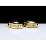 A pair of antique Victorian Sterling Silver gilt dressing table boxes by Thomas Wheeler, London