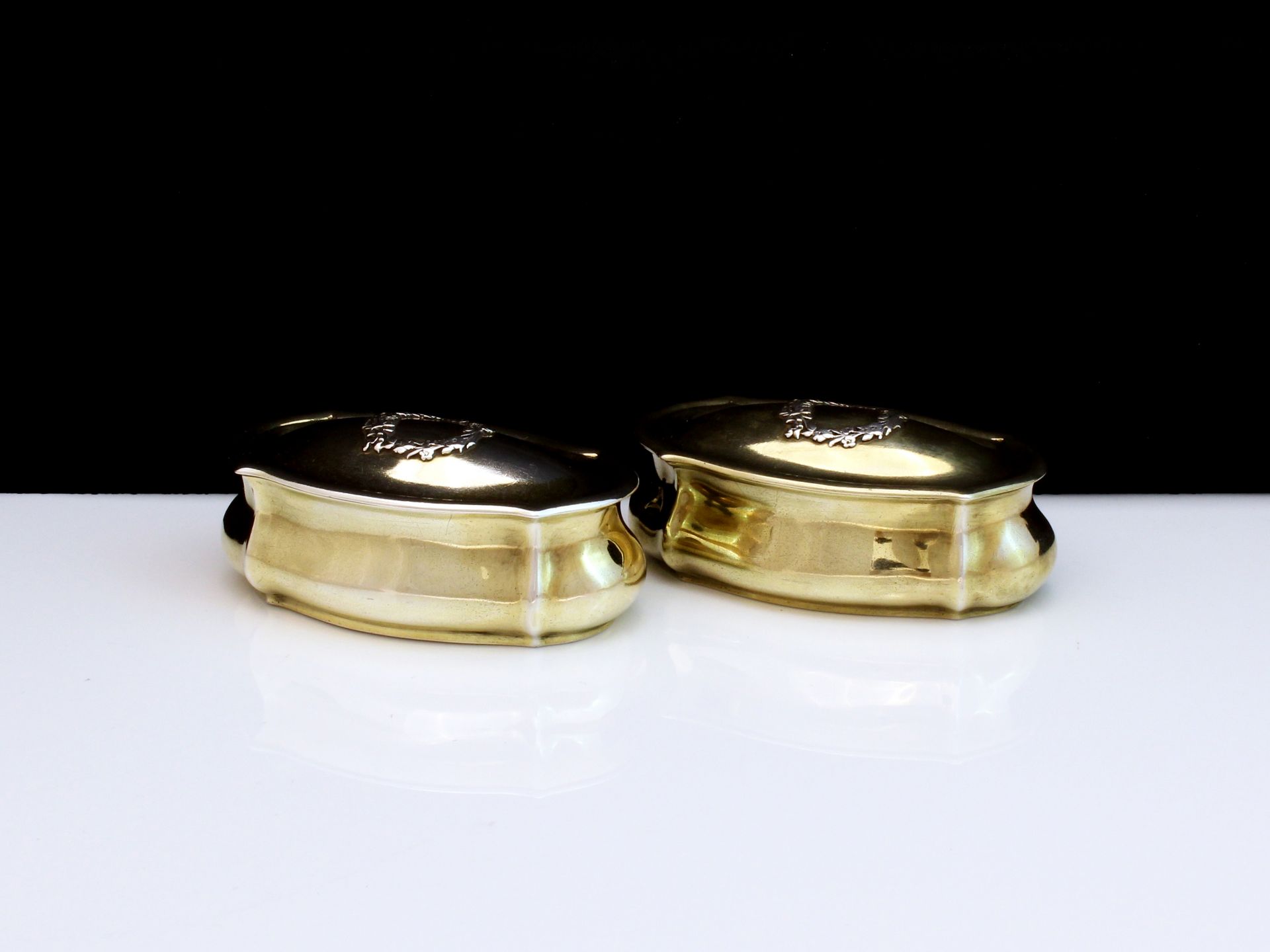 A pair of antique Victorian Sterling Silver gilt dressing table boxes by Thomas Wheeler, London