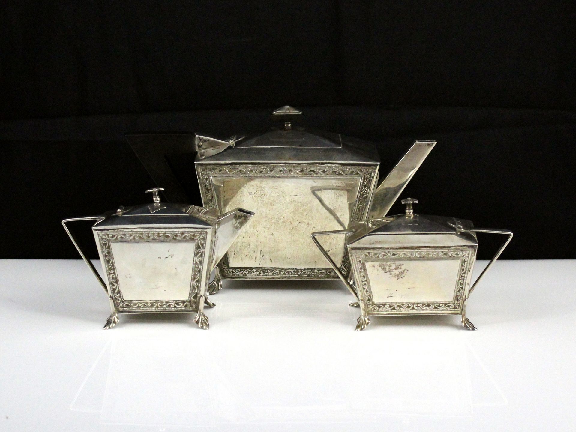 An antique Art Deco Ceylon / Sri Lankan Silver tea set stamped P S & Co Ceylon circa 1940.