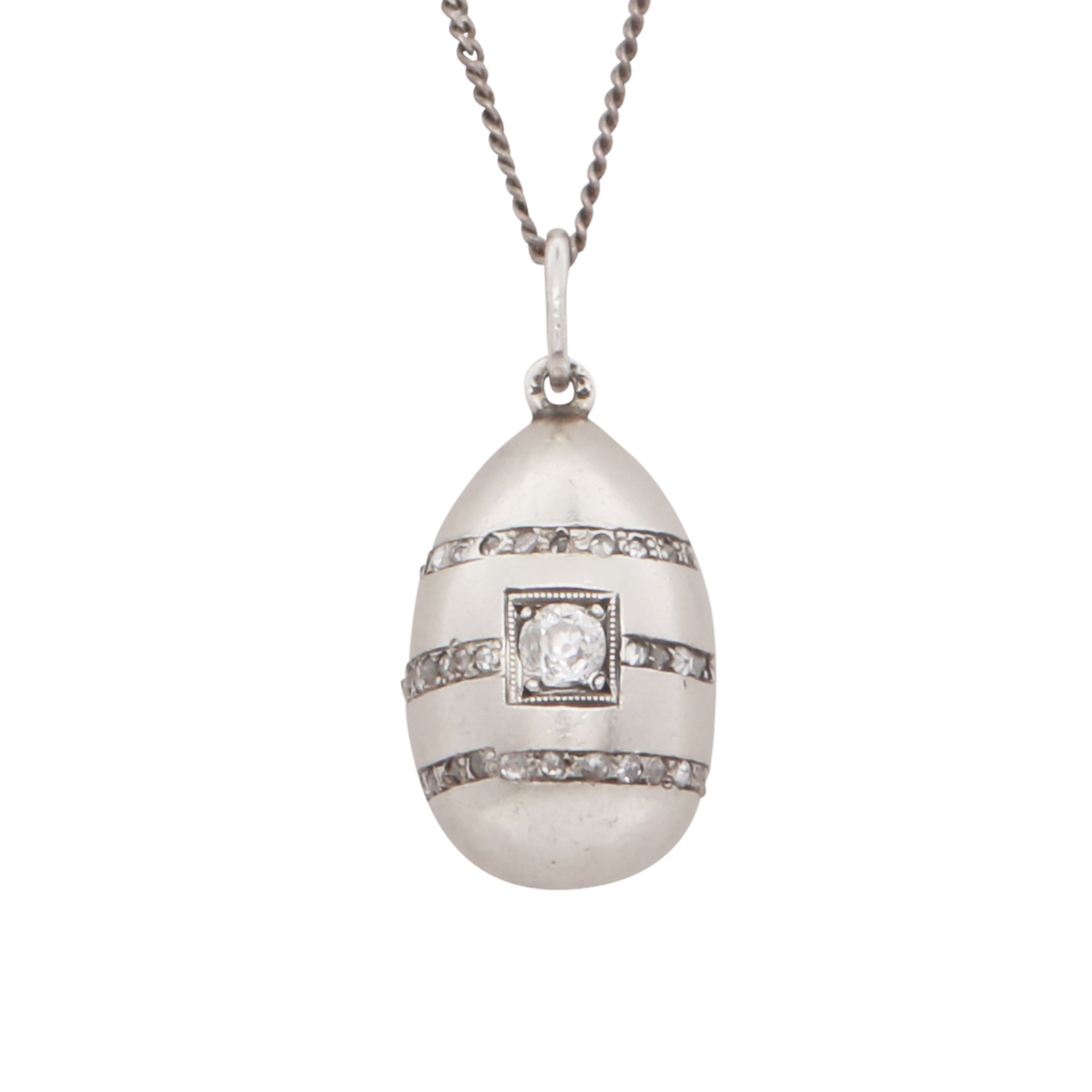 FABERGE A diamond egg pendant set in platinum, marked KF in cyrillic with workmasters mark of Henrik