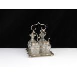 An antique Edwardian Sterling Silver cruet frame and set by Charles Henry Hattersley, Sheffield