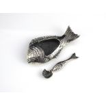 A Sterling silver salt cellar by Tiffany & Co of novelty form, modeled as a fish with hollowed