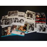 BOND - A large quantity of movie stills, mainly black and white - mostly Roger Moore (circa 100)