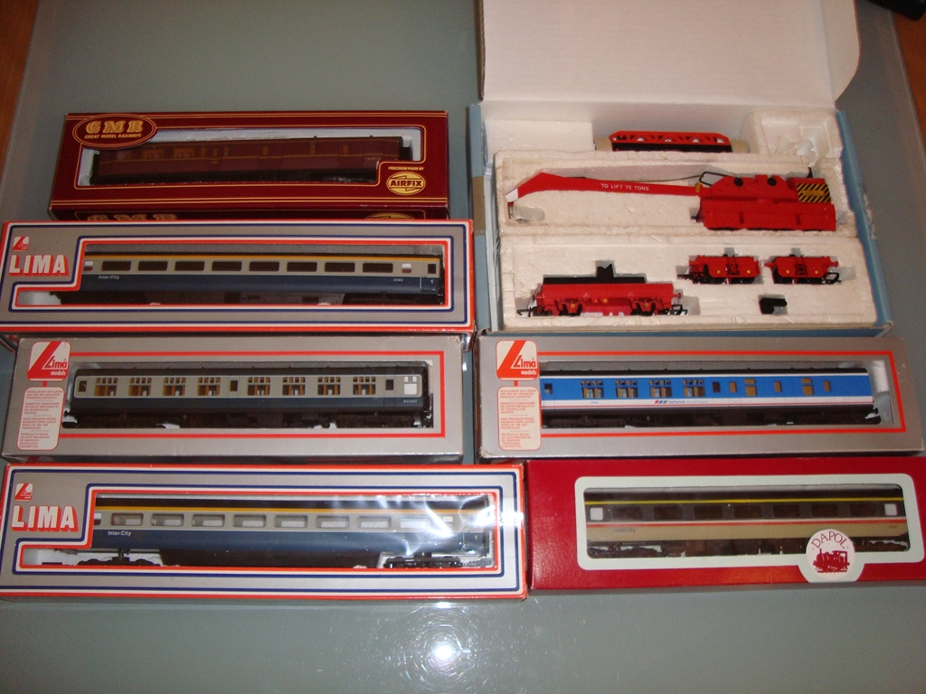 A group of coaches and wagons by Lima, Dapol, Airfix and Hornby - mostly boxed as lotted - Very