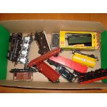 A Hornby Jinty locomotive in BR black together with a quantity of unboxed wagons as lotted -