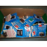A tray of Peco point motors and electrical accessories all still sealed in packets - Unused, Good to