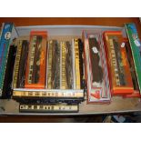 A tray of boxed and unboxed mostly GWR coaches by Hornby, Lima and others as lotted - Fair to