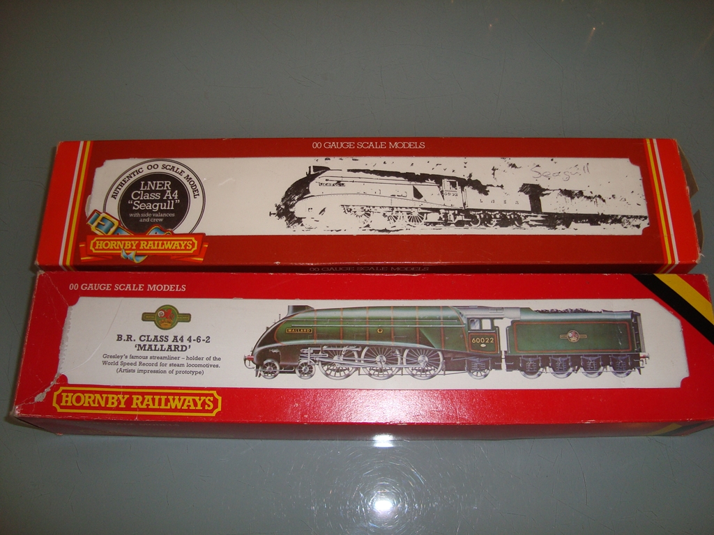 A pair of Hornby Class A4 locomotives, one in LNER blue "Seagull", one in BR Green "Mallard" -