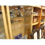 Glass display cabinet with adjustable shelves