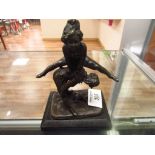 Bronze leap frog figure