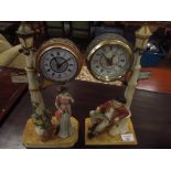 2 clock figurines