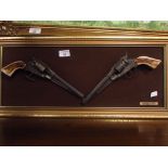 Mounted replica Remington guns