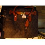 Ladies designer handbag marked MK