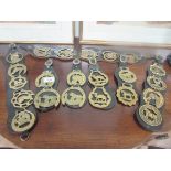 7 horse brasses on leather straps