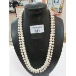 2 strings of pearls one with fully hall marked clasp 9ct gold