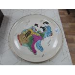 Oriental plate signed Nicole Roger