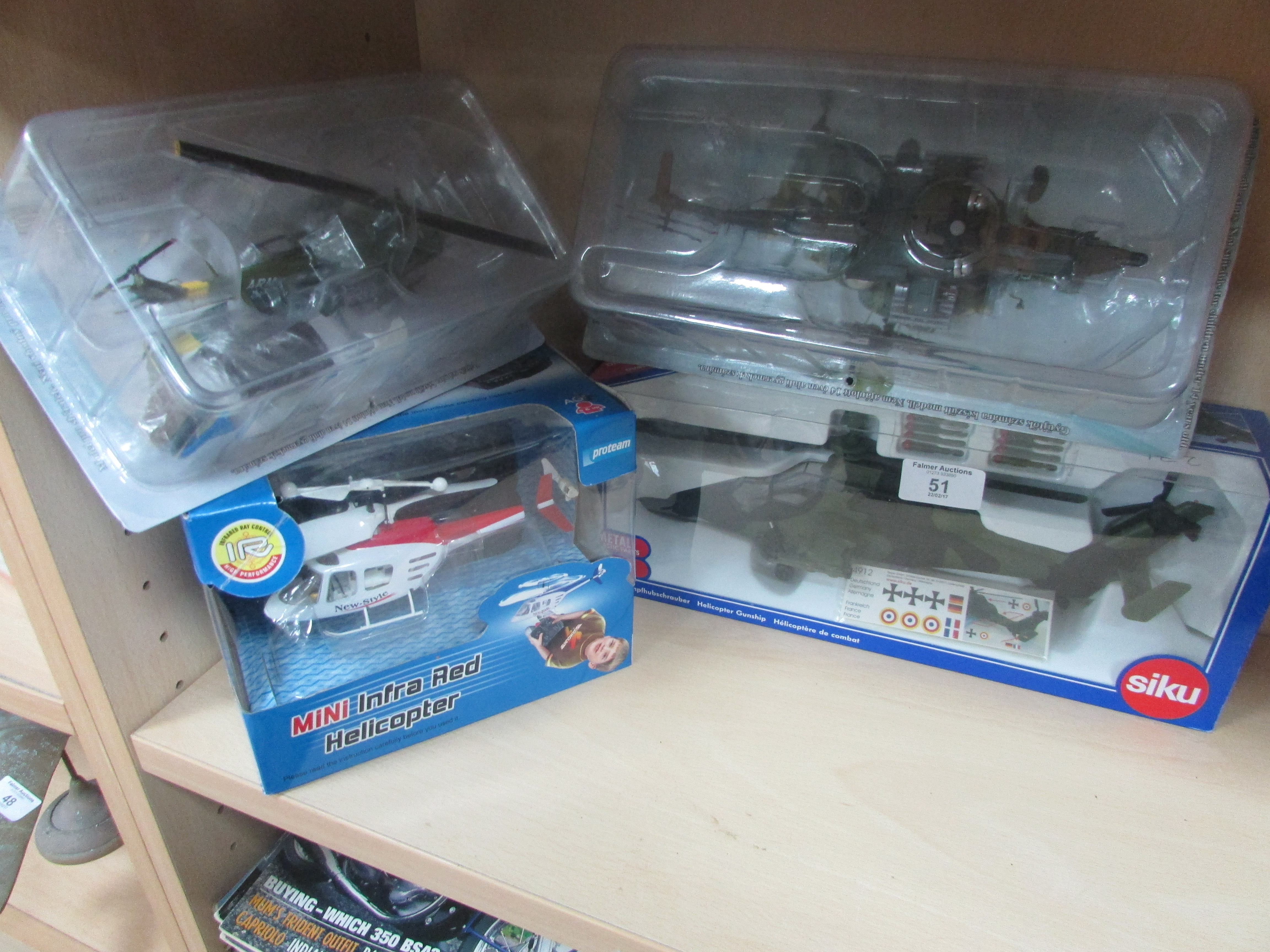 4 new and boxed model toy helicopters and planes