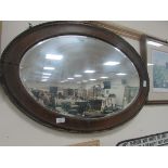 Oval wood framed mirror
