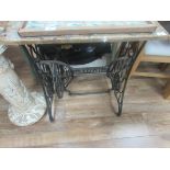 Singer wood top on sewing machine iron base