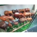 13 carved wood elephants