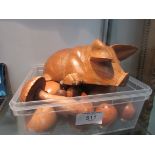 Treen items including pigs and eggs