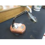 Desk magnifying glass on wood