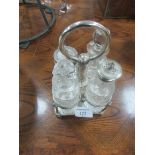 White metal and glass condiment set on stand
