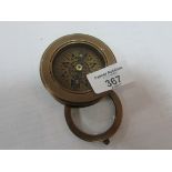 Brass unusual compass with built-in magnifying glass