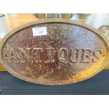 Cast iron oval antiques sign