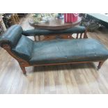 Oak and leather chaise lounge