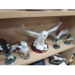 7 bird figurines