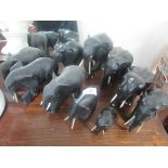 10 carved wood elephants