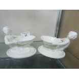 Pair Royal Worcester Putti holding shells