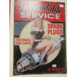 Large metal spark plug garage sign