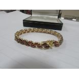 Fully hallmarked Vermeil gold and silver garnet bracelet