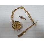 Gold marked 14ct ladies fob watch (glass broken) + yellow metal fob chain