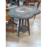 Carved wood occasional table