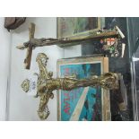2 brass crucifix's