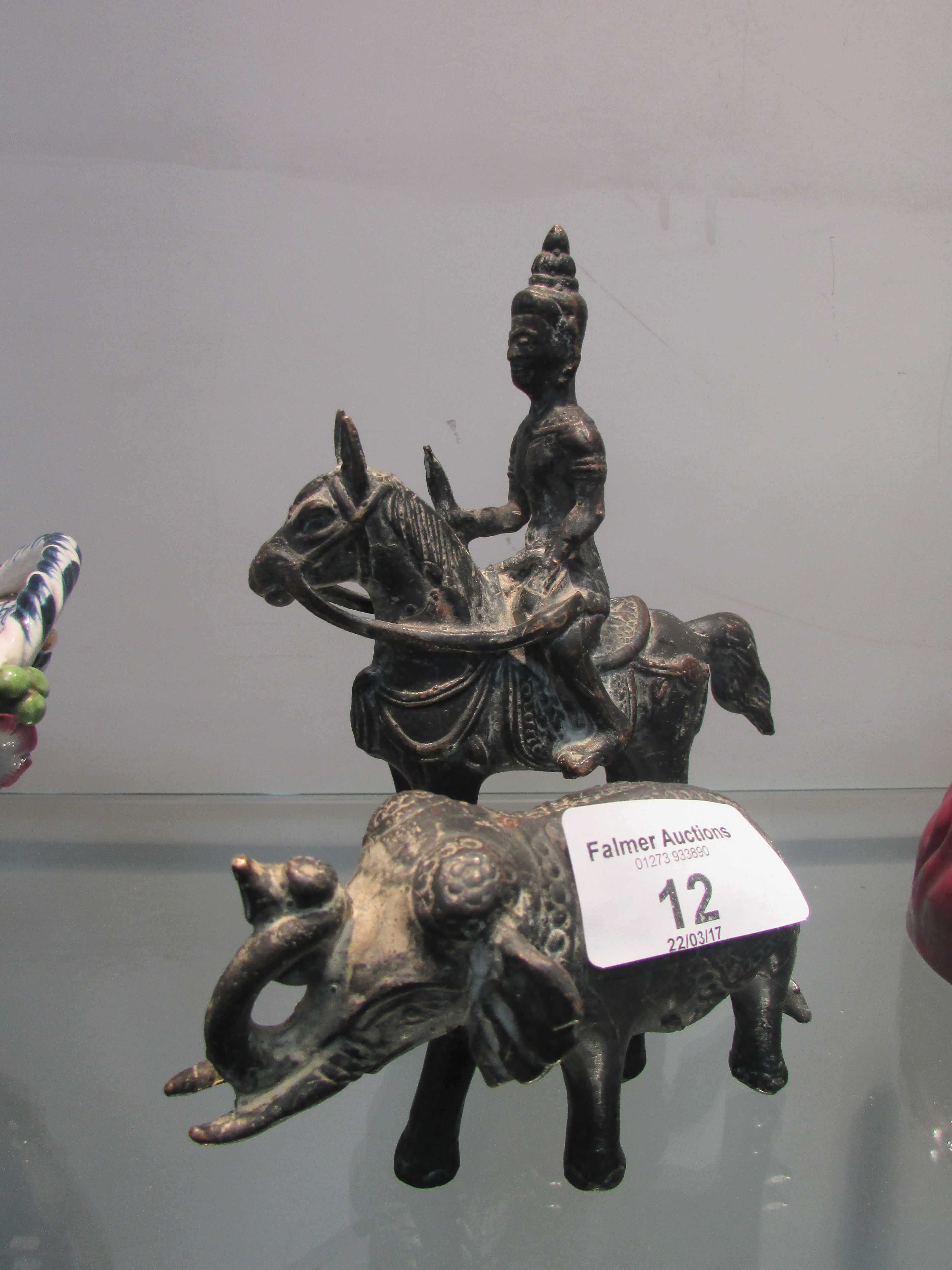 2 bronze figures ( 1 elephant + 1 horse and rider)