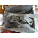 Box of metal hinges and brackets