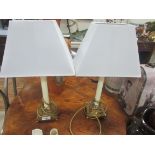 Pair of brass lamps + shades